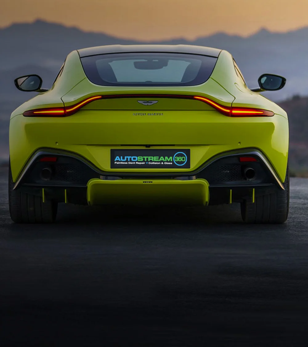 A sports car carrying an AUTOSTREAM360 plate, from the shop's own Franktown launch artwork