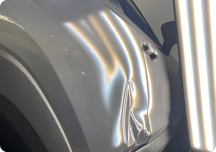 Technician working on a customer vehicle at AUTOSTREAM360