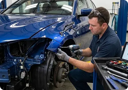 Wheel-arch dent repair in progress